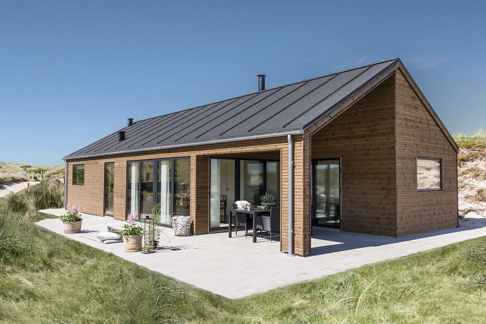 Bygge nyt eller købe brugt sommerhus. Skanlux Byggefirma guide.