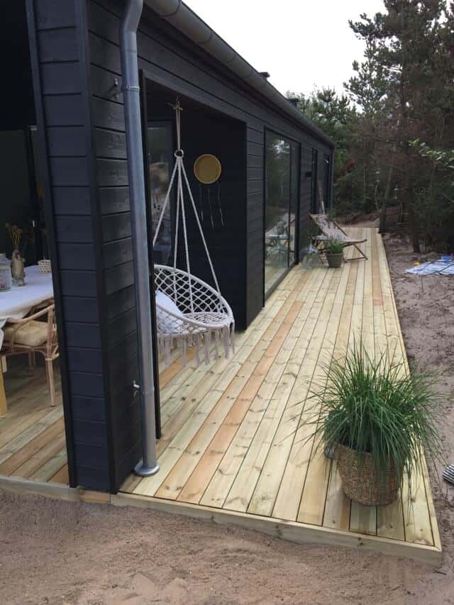 Sort skanlux trend sommerhus i sommerdrømme