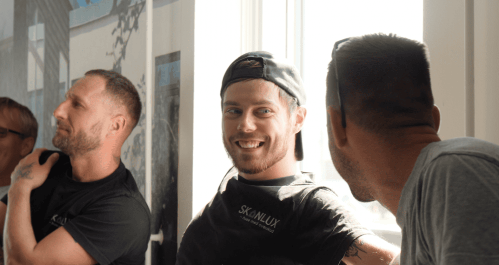 Glade Skanlux håndværkere i dialog