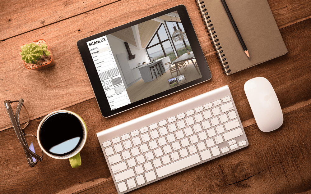 iPad på arbejdsbord der viser sommerhus konfiguratoren